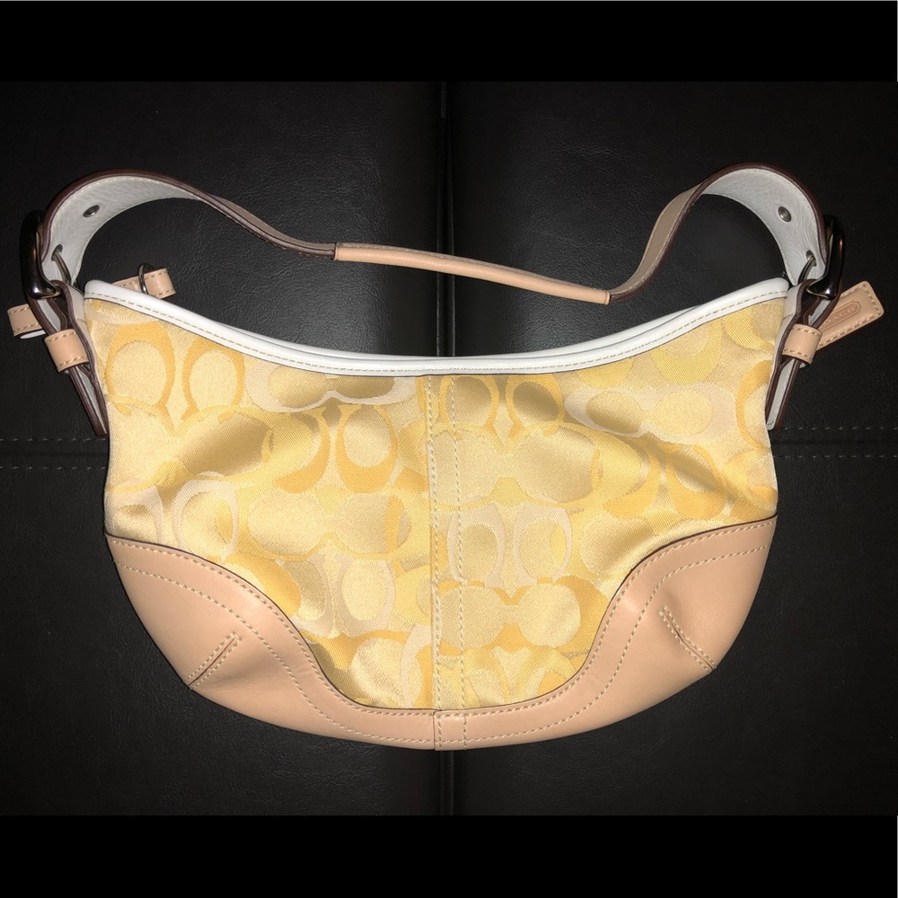 Small yellow coach purse
